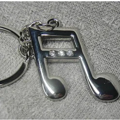 12 PORTACHIAVI BOMBONIERE CONFETTI A FORMA DI NOTA MUSICALA PER COMPLEANNO FESTE