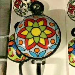 APPENDINO GANCIO PARETE APPENDIABITI METALLO CERAMICA DECORI ASS. 13X4CM 749346