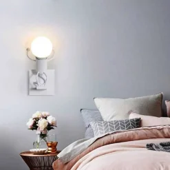 APPLIQUE DA PARETE DECORATIVO FORMA OMINO CHE SALTA IN METALLO ATTACCO E27 AQ50