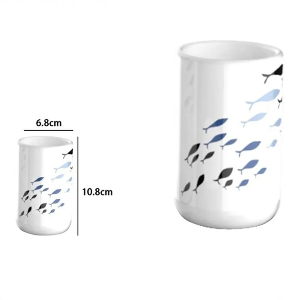 BICCHIERE PORTA SPAZZOLINO BIANCO CON PESCIOLINI IN CERAMICA ARREDO BAGNO 69876