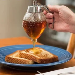 DISPENSER MIELE IN PLASTICA FORMA DI VASO CON BASAMENTO ACCESSORI CUCINA TX-9536