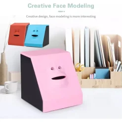 SALVADANAIO DINAMICO A FORMA DI VISO IN PLASTICA INDUZIONE ELETTRICA DIVERTENTE