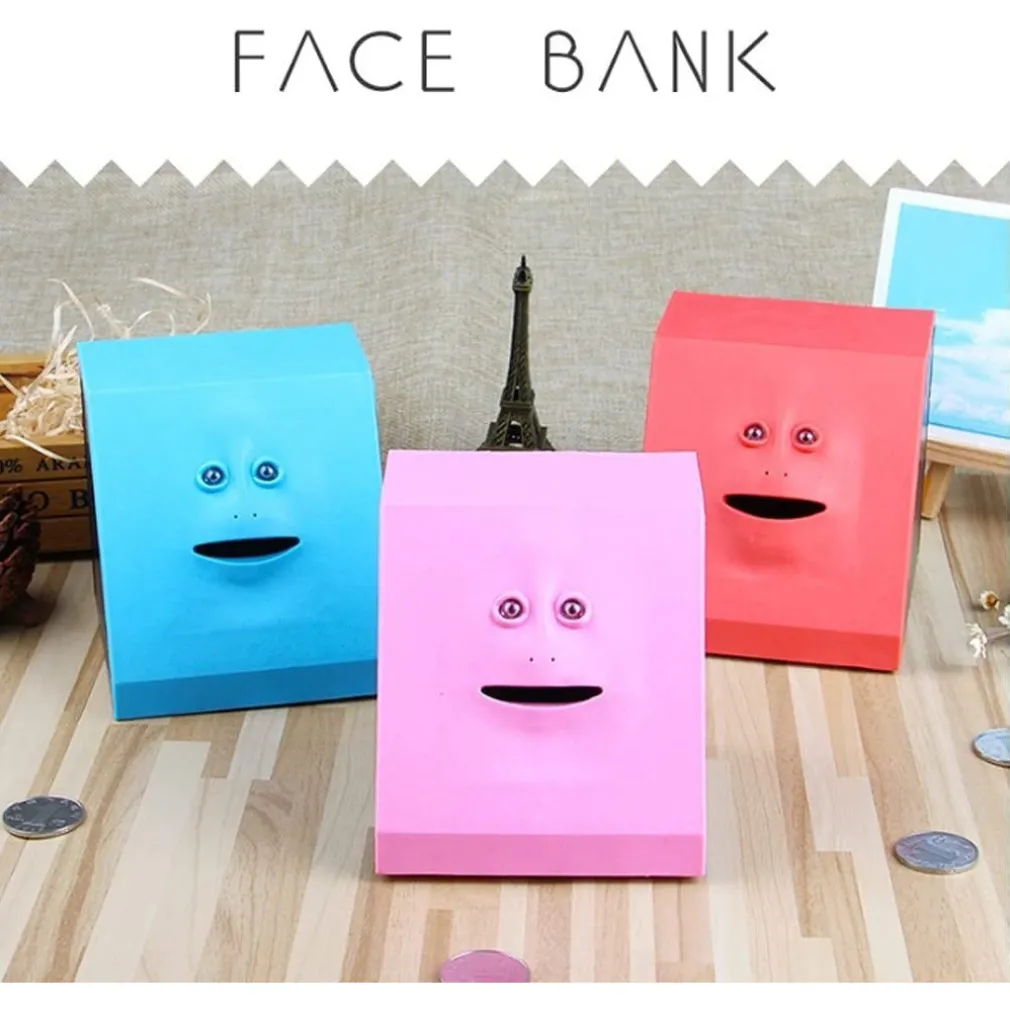 SALVADANAIO DINAMICO A FORMA DI VISO IN PLASTICA INDUZIONE ELETTRICA DIVERTENTE